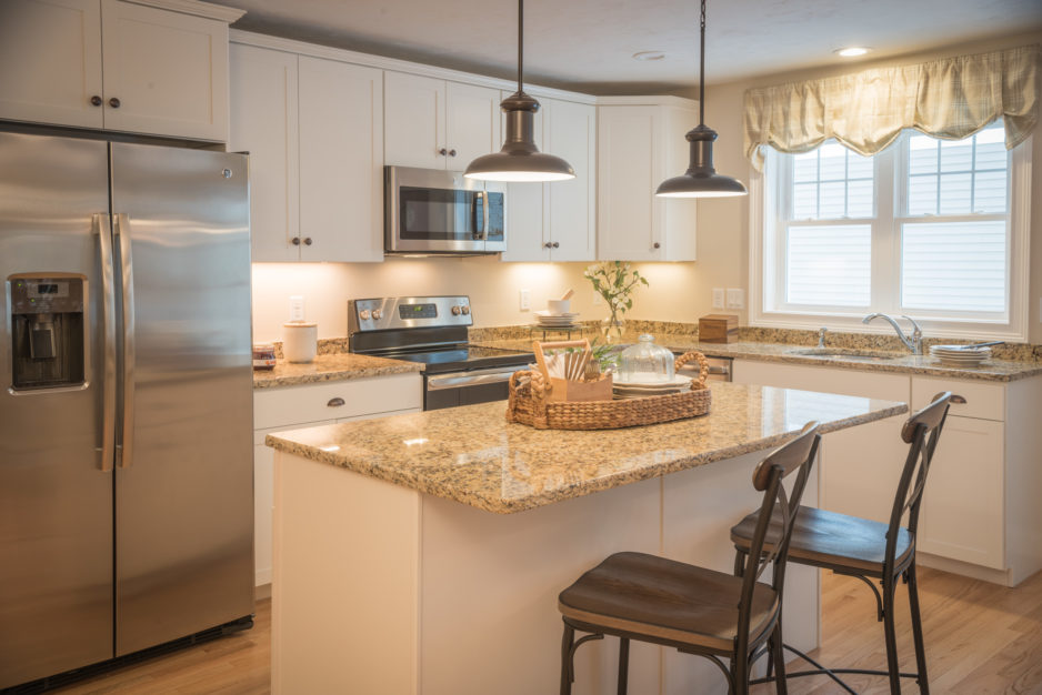 A conveneient kitchen island in a Redbrook Plymouth home