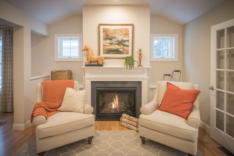 A warm, toasty sitting room with a fireplace in Plymouth, Massachusetts